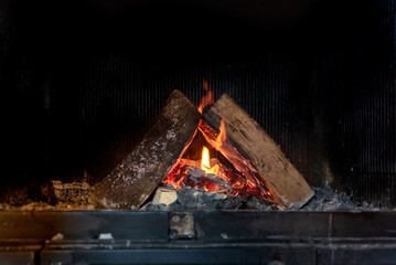 Fire in fireplace with burning flames