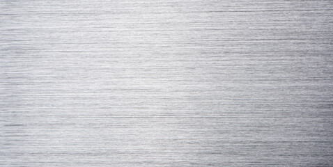 Brushed metal stainless steel texture background with reflection light