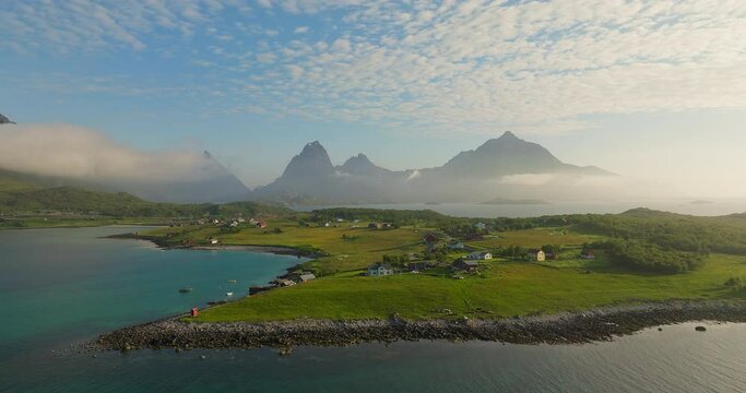 Idyllic View Of Holdoya Island Village During Sunrise In Hadsel, Nordland, Norway. Aerial Wide Shot