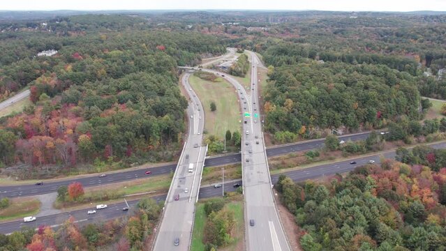 Drone footage over Donald Lynch Boulevard and Route 495 in Marlboro, Massachusetts. Overpass crosses the state highway.