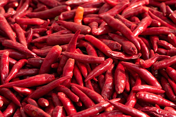 Ripe red hot chili peppers vegetable texture background. 