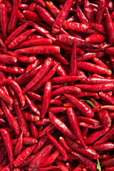 Ripe red hot chili peppers vegetable texture background. 