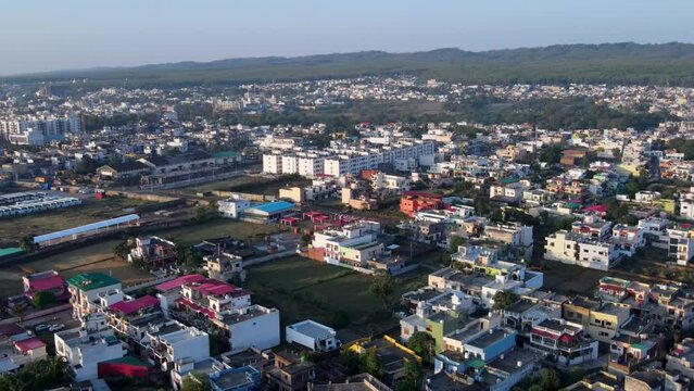 Aerial view of Dehradun city, Uttarakhand, India. Drone shot of the beautiful Indian City. Fast-growing Indian Cityscape.