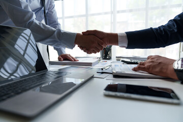 Businessman shaking hands with partner. Greeting. Business joint venture concept. For business finance, investment, teamwork and successful business.