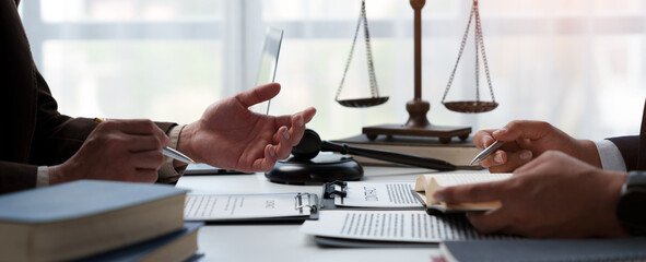 Lawyer, legal advisor, businessman brainstorming information on agreement details Business...