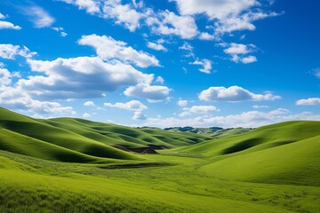 Captivating natural landscape featuring rolling hills and clear blue skies