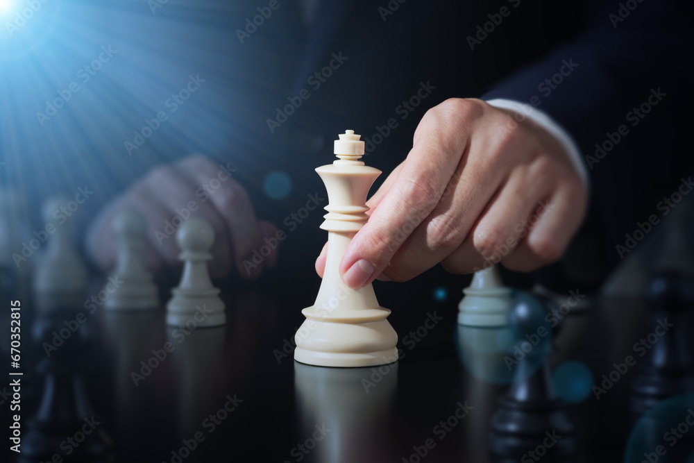 Poster Challenge new business strategies. Businessman moving a chess piece forward. Lots of statistics graphs and financial data.
