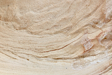 Close up of eroded rock strata with space for copy