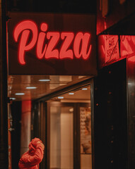 sign pizza restaurant street New York winter 