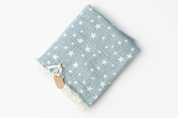 Muslin blanket with star pattern on white background