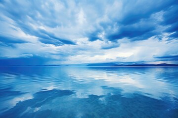 Fototapeta premium a storm clearing over a tranquil sea reflecting calmness