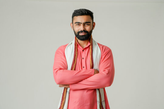 Young indian farmer giving expression on white background.