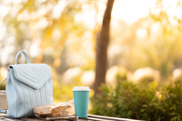 coffee and breakfast outdoors, walk in the park, no people, background, space for text