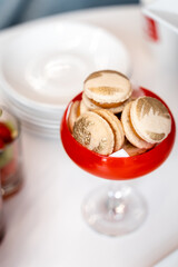 buffet, bright treats for guests, desserts and champagne 
