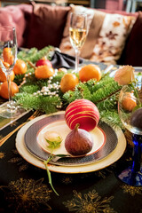Christmas table with fresh mandarins