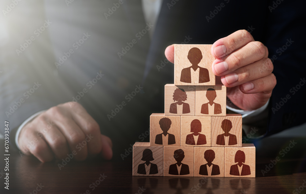 Poster business manager selecting leader and building successful team. businessman stacking wooden blocks. 