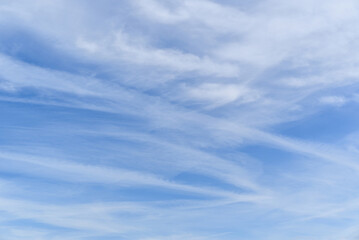 White clouds in a bright blue sky. The beauty of the nature	