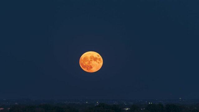 A supermoon rises over Fort Collins, Colorado.