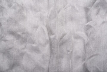 The textured background of the white scarf is made from polyester fiber.