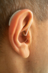 Hearing aid ear of man