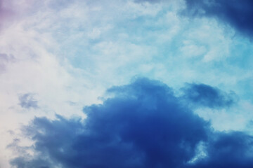 High clouds in the summer sky. Sky background. Meteorological observations of the sky.