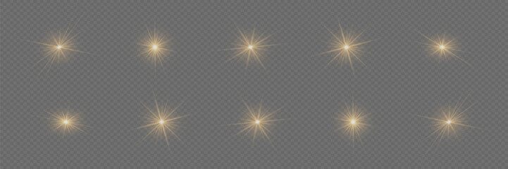 Golden glowing light explodes on a transparent background. A set of sparkling magical dust particles. Bright Star. Transparent sun, bright flash. Vector sparkles.