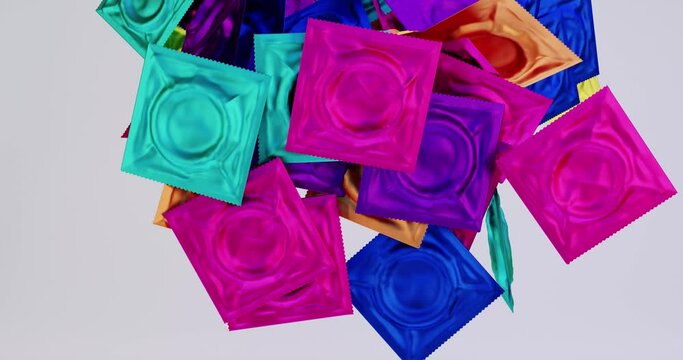 3d animation stylized bright condoms fall and fill the entire screen. Pattern screensaver, background, contraceptives, safety concept, healthy lifestyle