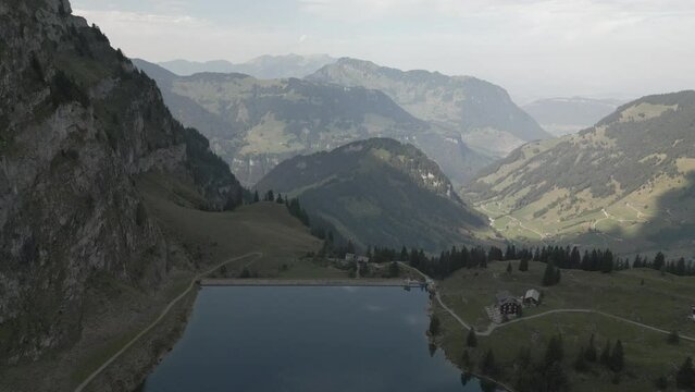 Drone footage over the Bannalpsee reservoir in Wolfenschiessen, Nidwalden Canton, Switzerland