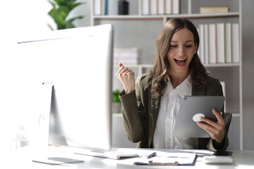 Attractive businesswoman working in the office.