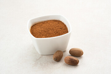 Pala Bubuk (Nutmeg Powder) on white bowl
