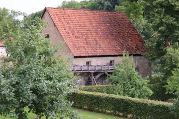 Fototapeta na wymiar Blick auf die Historische Mühle auf dem Klostergelände von Kloster Dalheim im Paderborner Land 