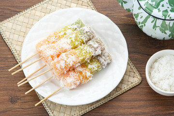 Sentiling or ongol-ongol, Indonesian traditional snack, made from cassava sprinkled with grated...