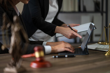 Partner lawyers or attorneys discussing a contract agreement. Successful businessmen have a contract in place to protect it,signing of modest agreements form in office...