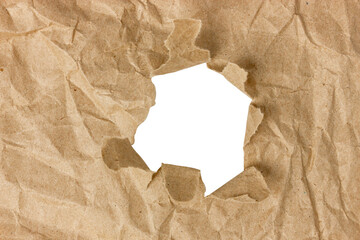 Hole in the wax paper. A torn piece of paper. A hole in the center.