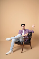 Photo of young Asian man on background