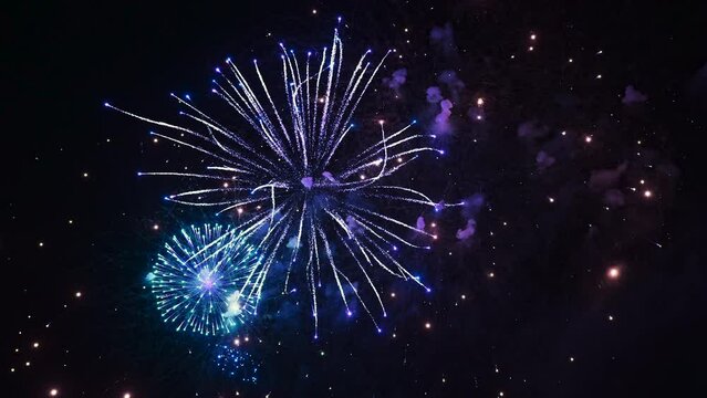 Loop Seamless of Real Fireworks Background. Real Multicolor Shining Fireworks With Bokeh Lights in the Night Sky. Glowing Fireworks Show. Opening Shot Slow Motion Fireworks Celebration 4K