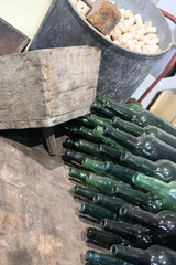 Green glass bottles of Cider and cork stoppers for bottling