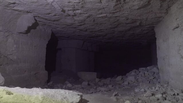 Limestone quarry (stone sawing), which is 200 years old. Underground halls, piles of sawn stones, zigzag corridors, dead ends, niches. Object for spelunking