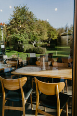 View from the window on the table setting at the garden cafe in Akureyri park in Iceland