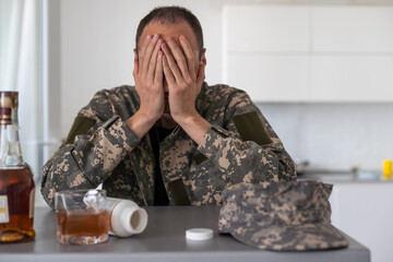 one man sit at home with bottle of liquor drink whiskey drunk alcoholic Alcohol abuse, addiction...