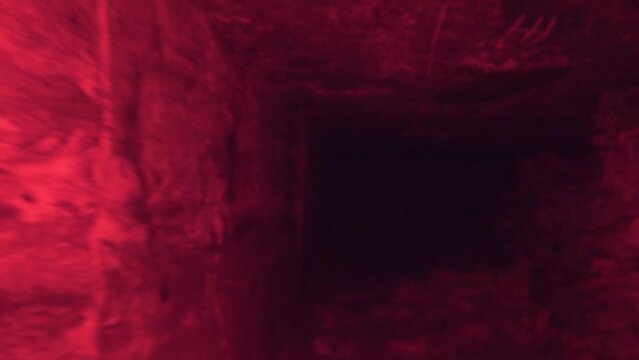 Limestone quarry (stone sawing), which is 200 years old. Underground halls, piles of sawn stones, zigzag corridors, dead ends. Object for spelunking. Red light illumination deepens the mystery