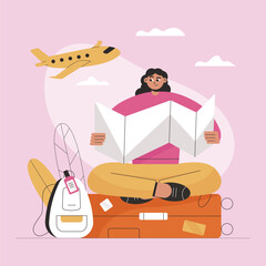 Woman seat on luggage and reads the map