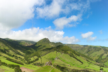 Fototapeta premium Island of Flores. Island of water. Portuguese Jurassic Park.Hills covered with vegetation.