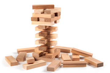 A game of logic and the ability to think. Jenga tower with wooden blocks on a white background.
