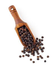 Black pepper in wooden spoon isolated on white background