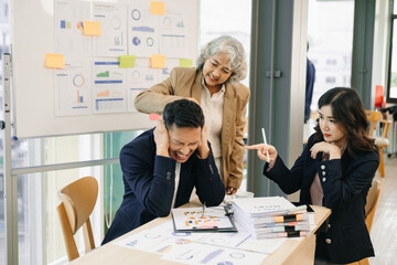 Team thinking of problem solution at office meeting, sad diverse business people group shocked by bad news, upset colleagues in panic after company bankruptcy concept..