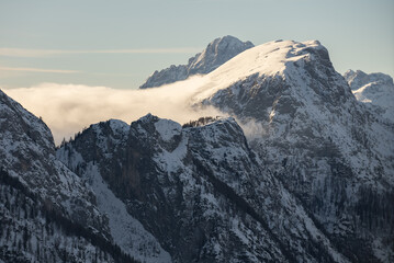 Civetta resort. Panoramic view of the Dolomites mountains in winter, Italy. Ski resort in Dolomites, Italy. Aerial  drone view of ski slopes and mountains in dolomites.