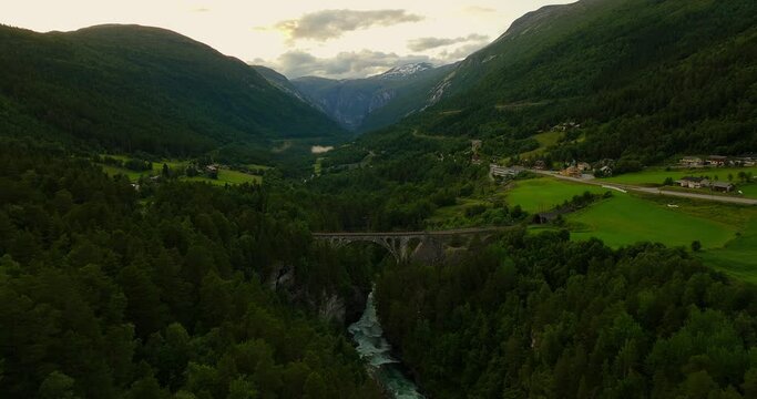 Historic Kylling railway bridge over Rauma river in Romsdalen Valley. Aerial