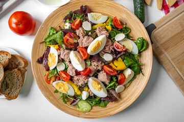 Appetizing fresh salad with canned tuna and vegetables.