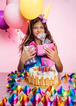 Happy girl enjoying her birthday party